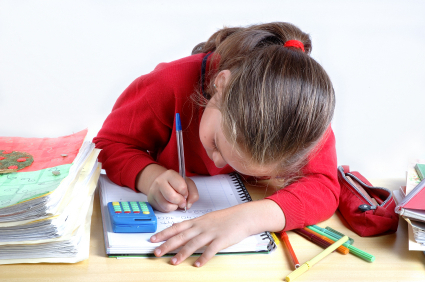 child doing money lesson